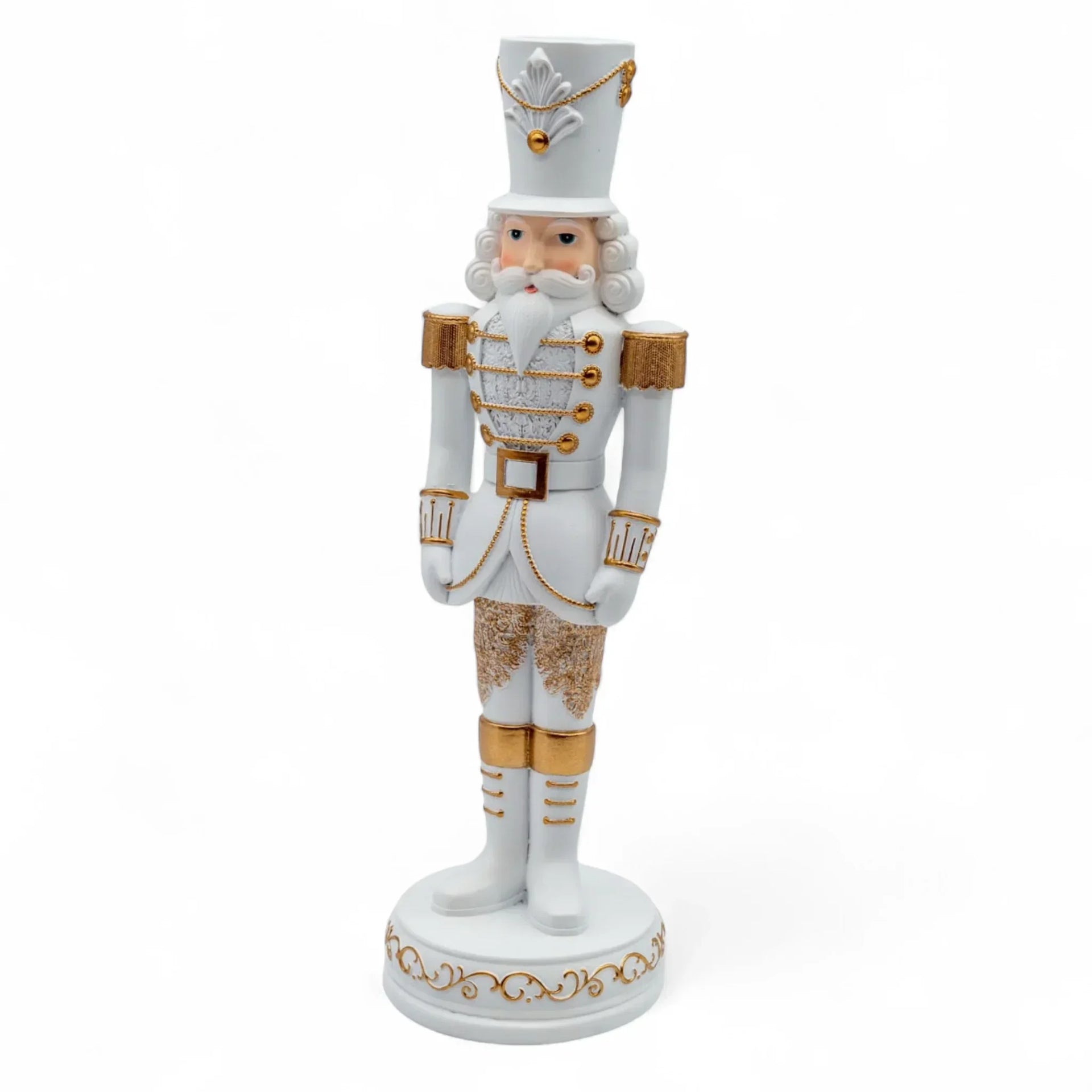 White and gold nutcracker soldier figurine, elegant Christmas holiday decoration with detailed uniform and base