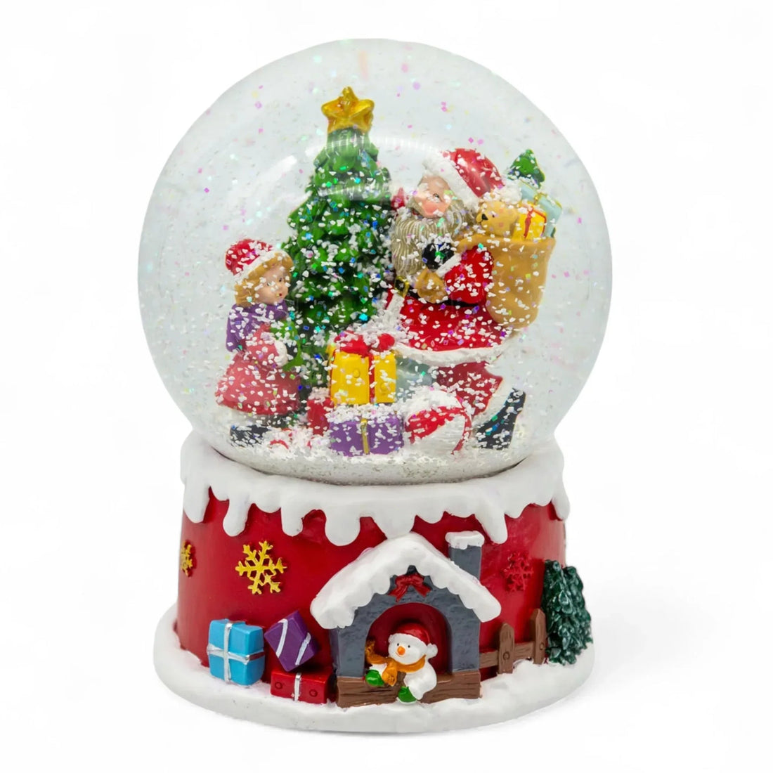 Christmas snow globe with Santa, child, tree, gifts, and snowman base for festive home décor