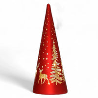 Red cone-shaped Christmas decoration with gold deer, trees, and snowflake patterns, glowing lights