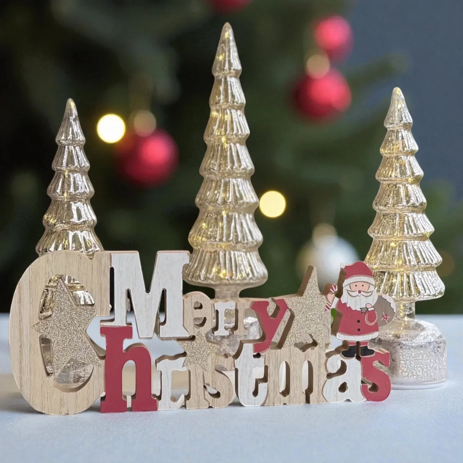 Merry Christmas wooden sign with glittery trees and Santa, festive holiday decor