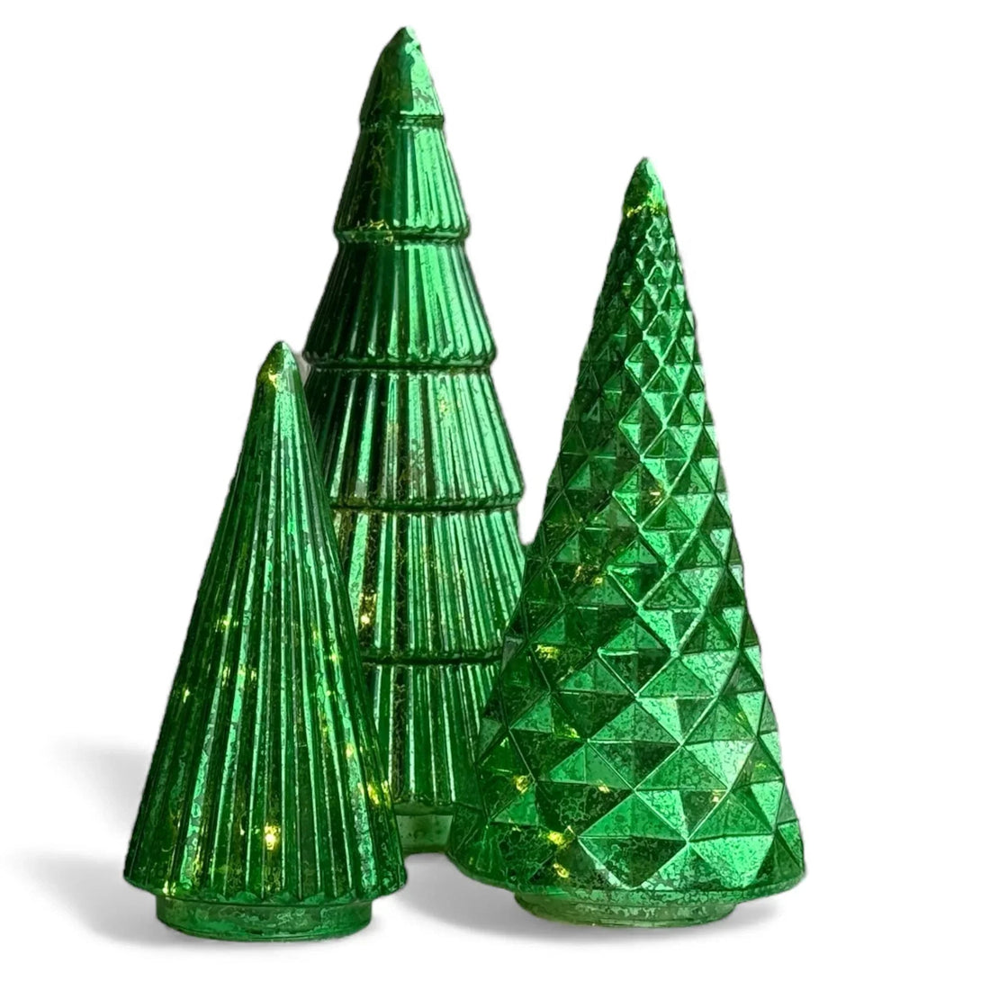 Green glass Christmas tree decorations with textured patterns and warm lights, perfect for festive home décor