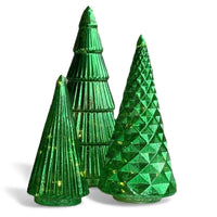 Green glass Christmas tree decorations with textured patterns and warm lights, perfect for festive home décor
