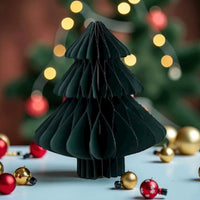 Modern black paper Christmas tree decoration with red and gold ornaments, festive holiday home décor