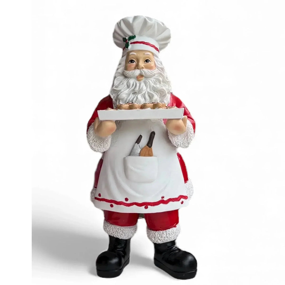 Chef Santa figurine holding tray of cookies, festive holiday home decor with apron and hat