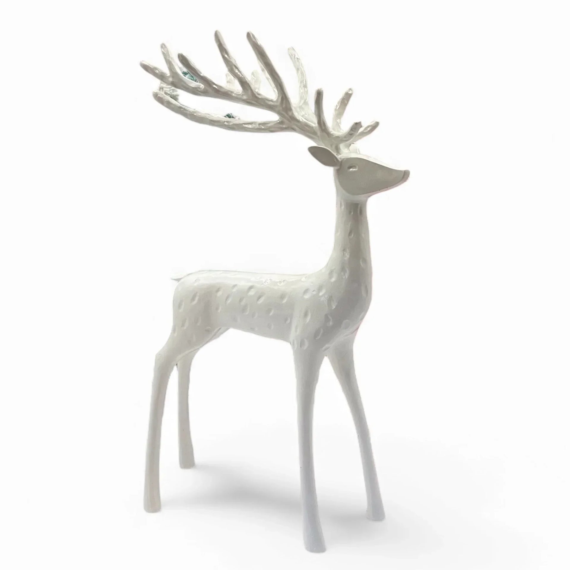 White ceramic deer figurine with textured spots and antlers, elegant home décor accent piece