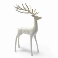 White ceramic deer figurine with textured spots and antlers, elegant home décor accent piece