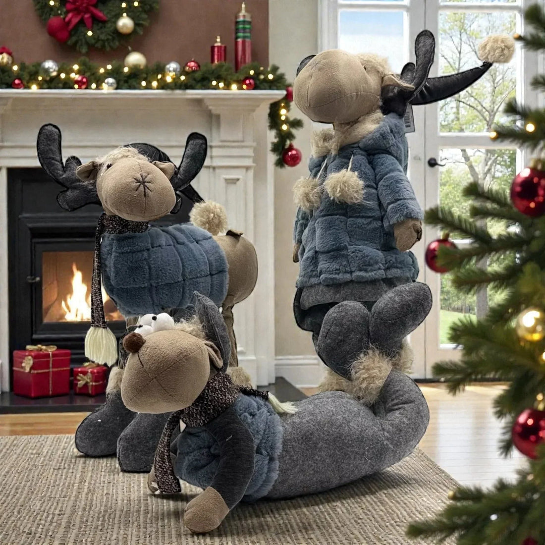 Cozy plush moose in winter coats, festive Christmas decor with fireplace & tree
