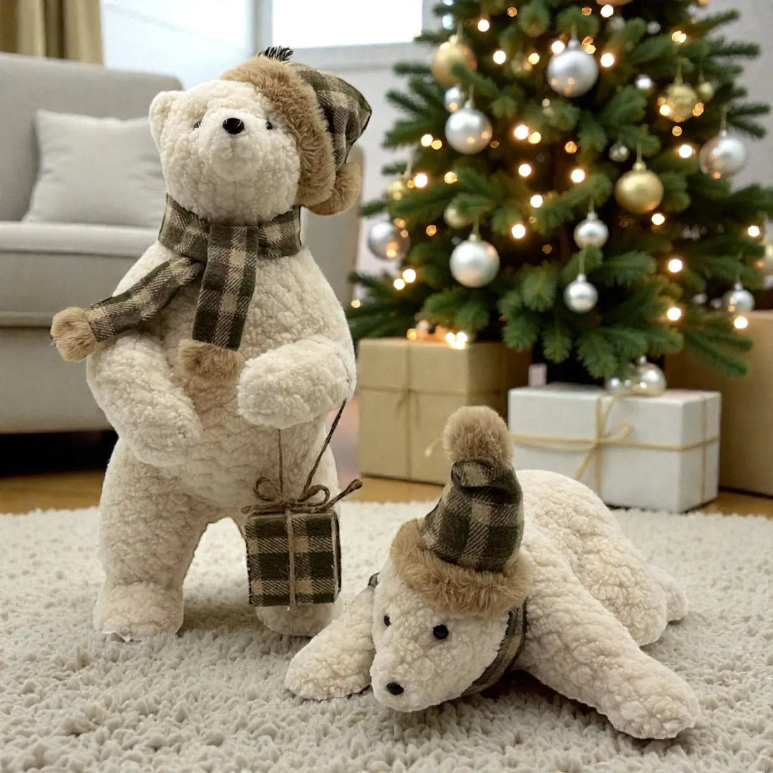 Fluffy white polar bear plush toys with plaid scarves and hats, festive Christmas decor near tree