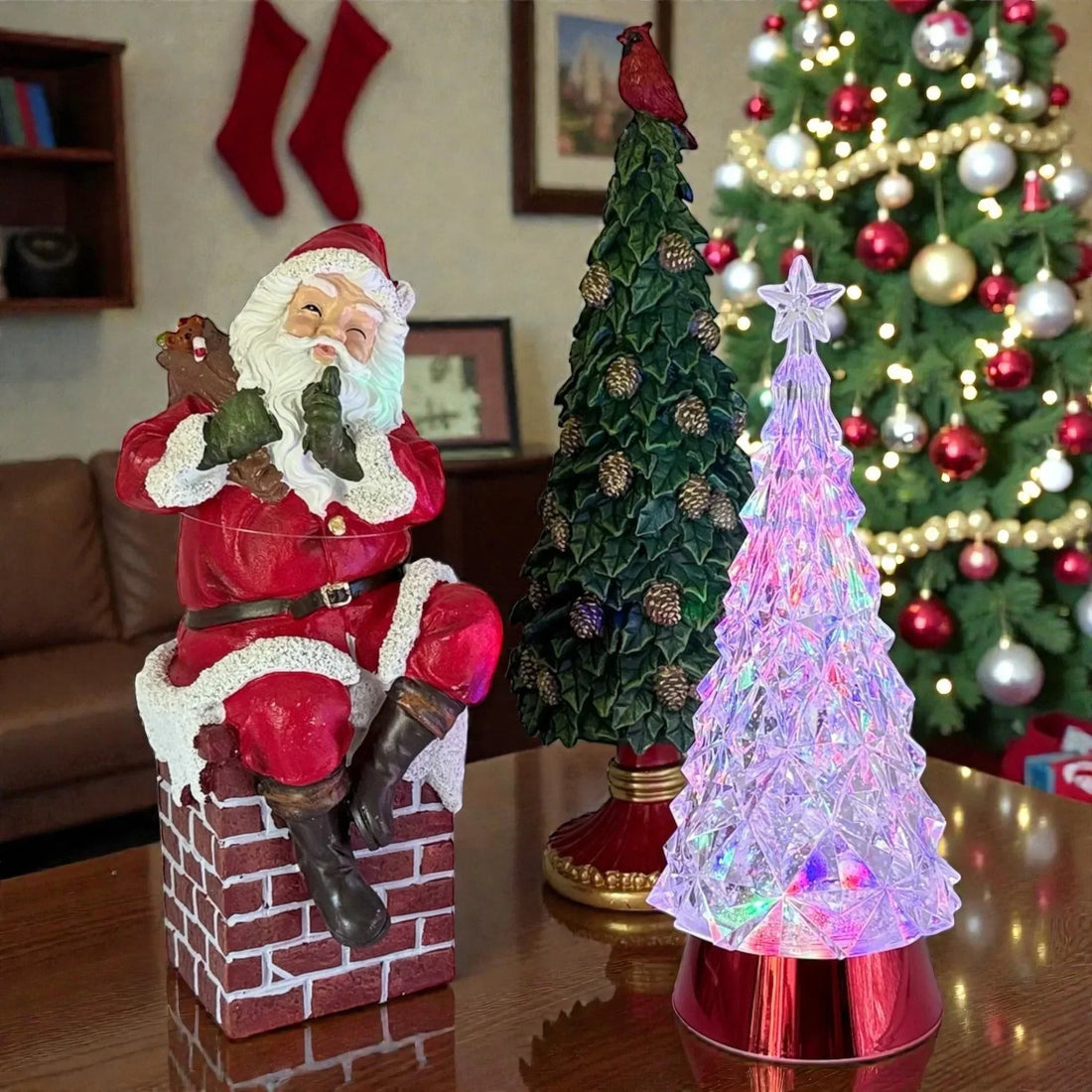Santa Claus figurine on chimney with holly pinecone tree and glowing crystal Christmas tree decor