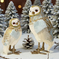 Elegant white owl ornaments with gold glitter accents, perfect for Christmas decor and winter home styling