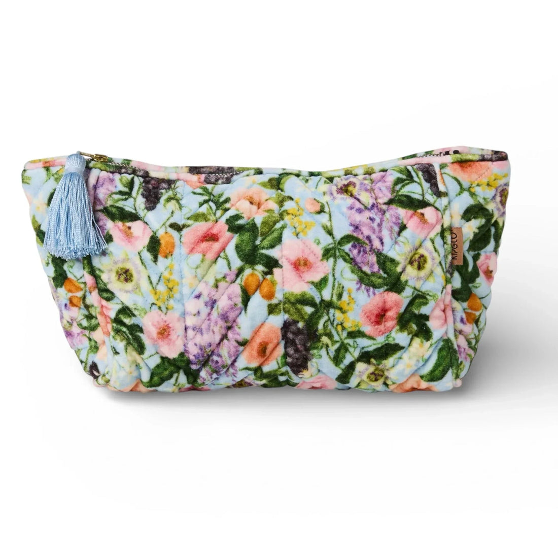 Quilted floral makeup bag with blue tassel, perfect for home décor or travel essentials
