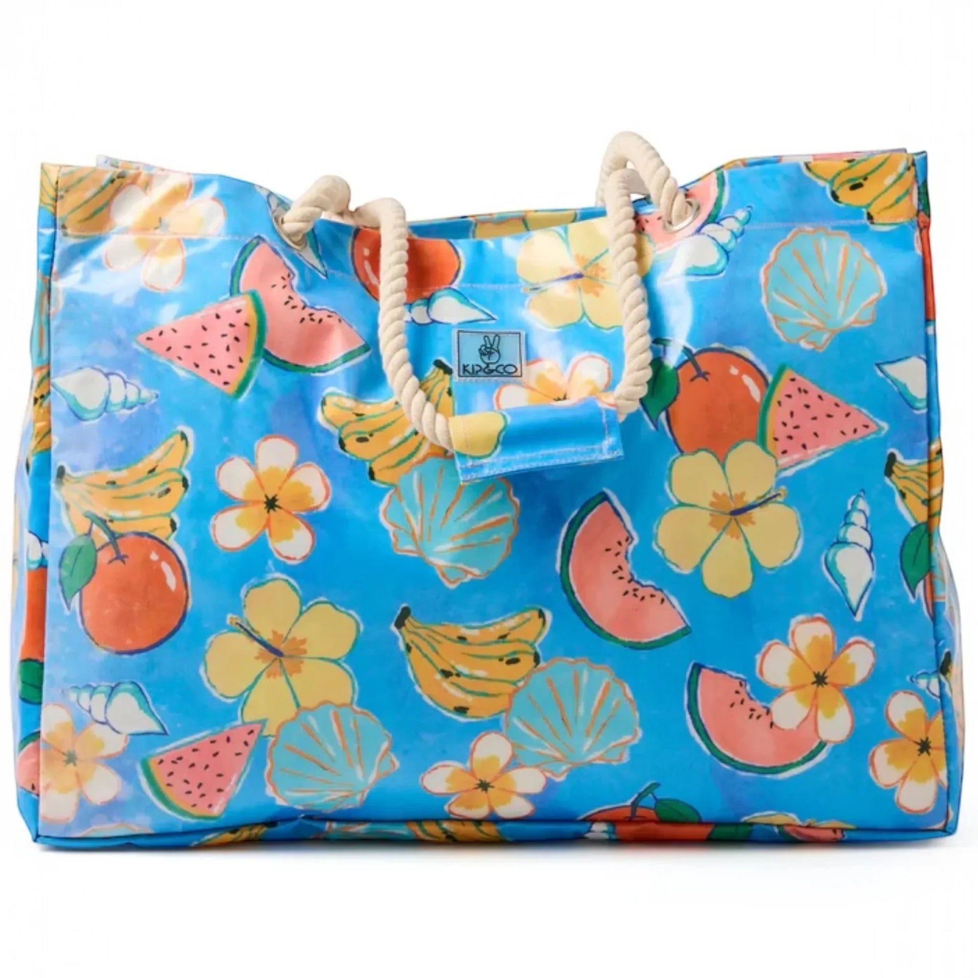 Blue beach tote bag with watermelon, bananas, flowers, and seashells print, rope handles