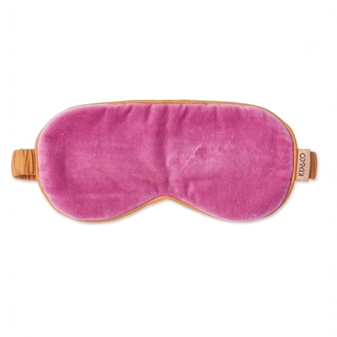Pink velvet sleep mask with tan trim, luxury bedtime accessory for restful sleep