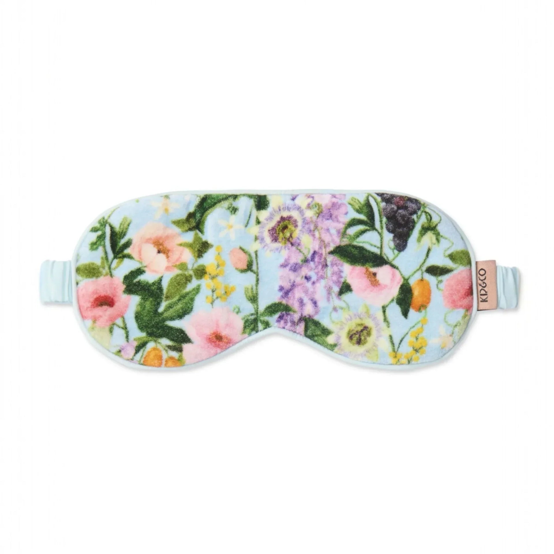Floral print sleep mask with pink roses, purple blooms, and green leaves on light blue background