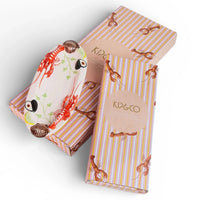 Kip&Co lobster print ceramic serving platter with seashell accents, packaged in striped gift box