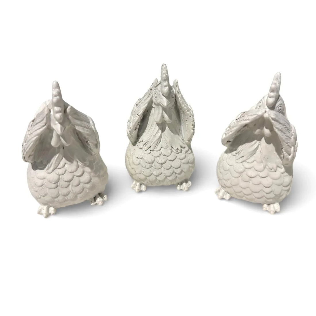 Set of three white ceramic chicken figurines with textured feathers, home décor accents