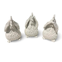 Set of three white ceramic chicken figurines with textured feathers, home décor accents