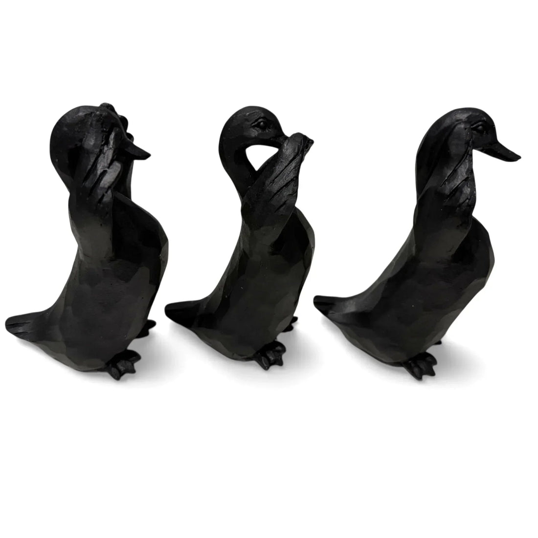 Three black duck figurines in wise monkey poses, home décor accents for elegant interiors