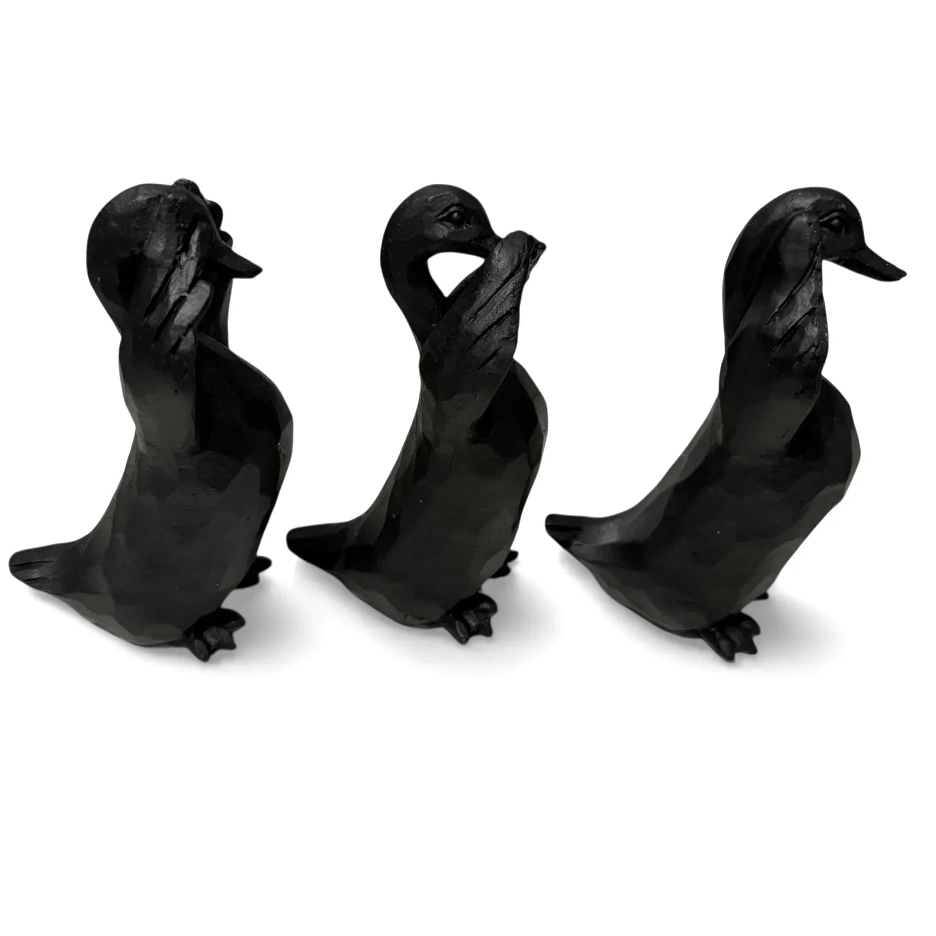 Three black duck figurines in wise monkey poses, home décor accents for elegant interiors