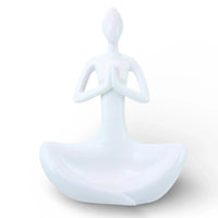 White ceramic yoga figure sculpture for home décor, minimalist zen accent piece