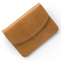 Tan leather cardholder with textured finish and neat stitching, ideal for minimalist home accessories