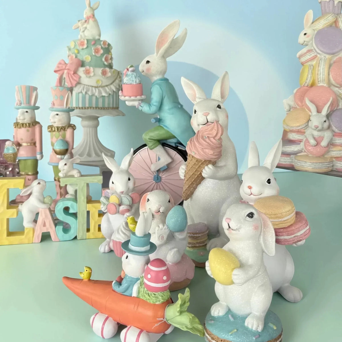Charming Easter bunny figurines with pastel cakes, ice cream, and macarons for spring home décor