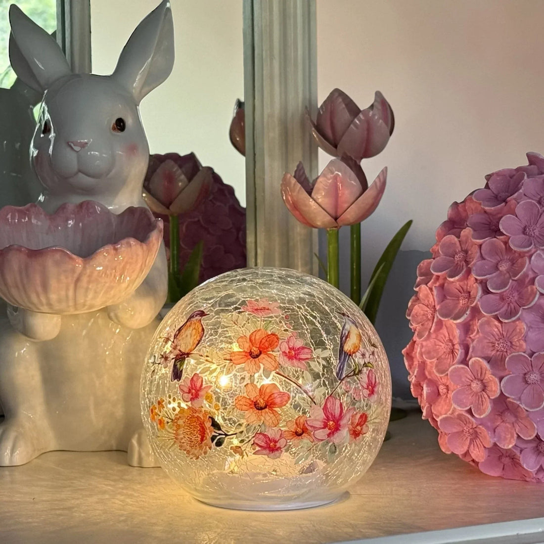 Glowing floral bird globe lamp with ceramic bunny and pink tulips, elegant home décor accent