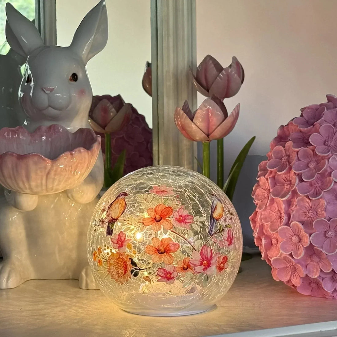 Glowing floral bird globe lamp with ceramic bunny and pink tulips, elegant home décor accent