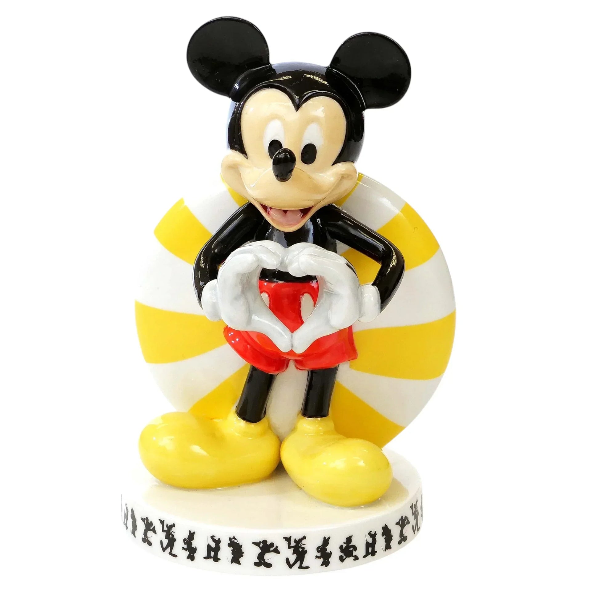 Mickey Mouse figurine making heart shape with hands, vintage-style home decor accent piece