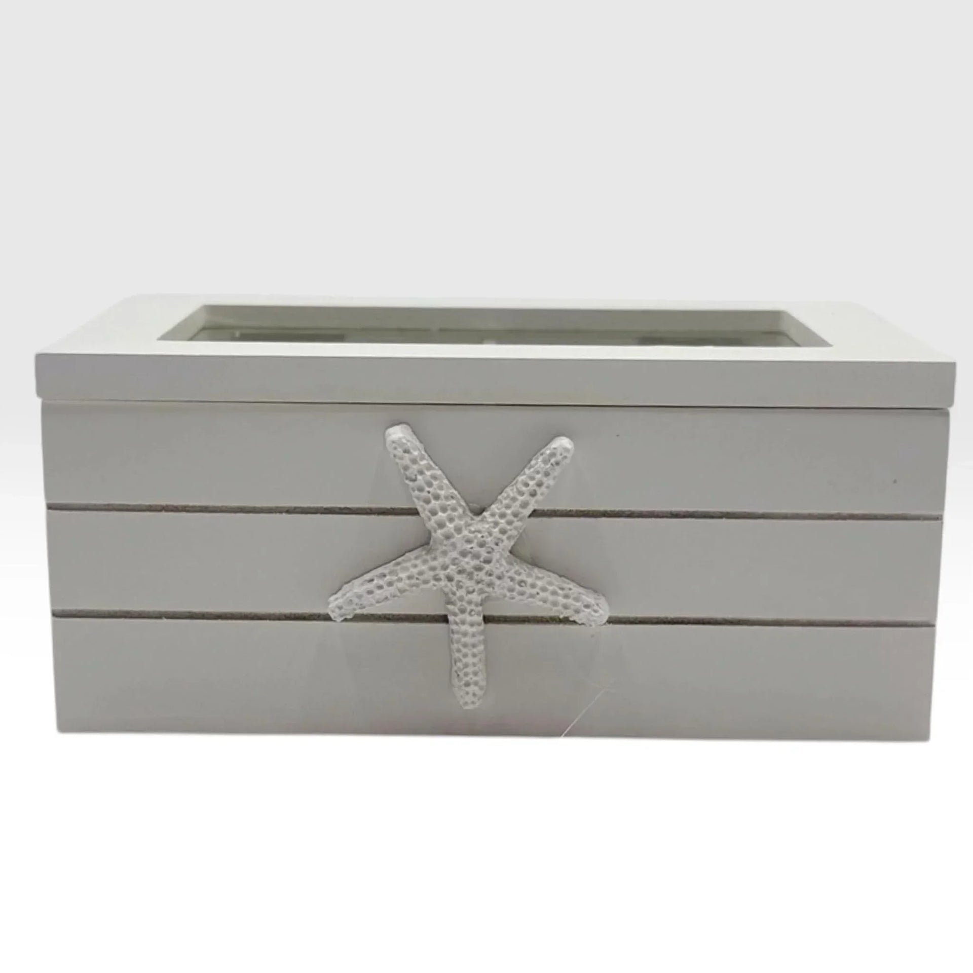 White coastal-style storage box with starfish accent, perfect for beach home décor and vintage-inspired interiors.