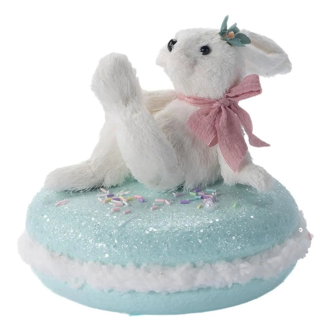 White bunny figurine with pink bow sitting on glittery blue macaron, perfect for home décor or Easter display.