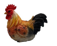 Colorful rooster figurine with red comb, golden feathers, and black tail for rustic home décor