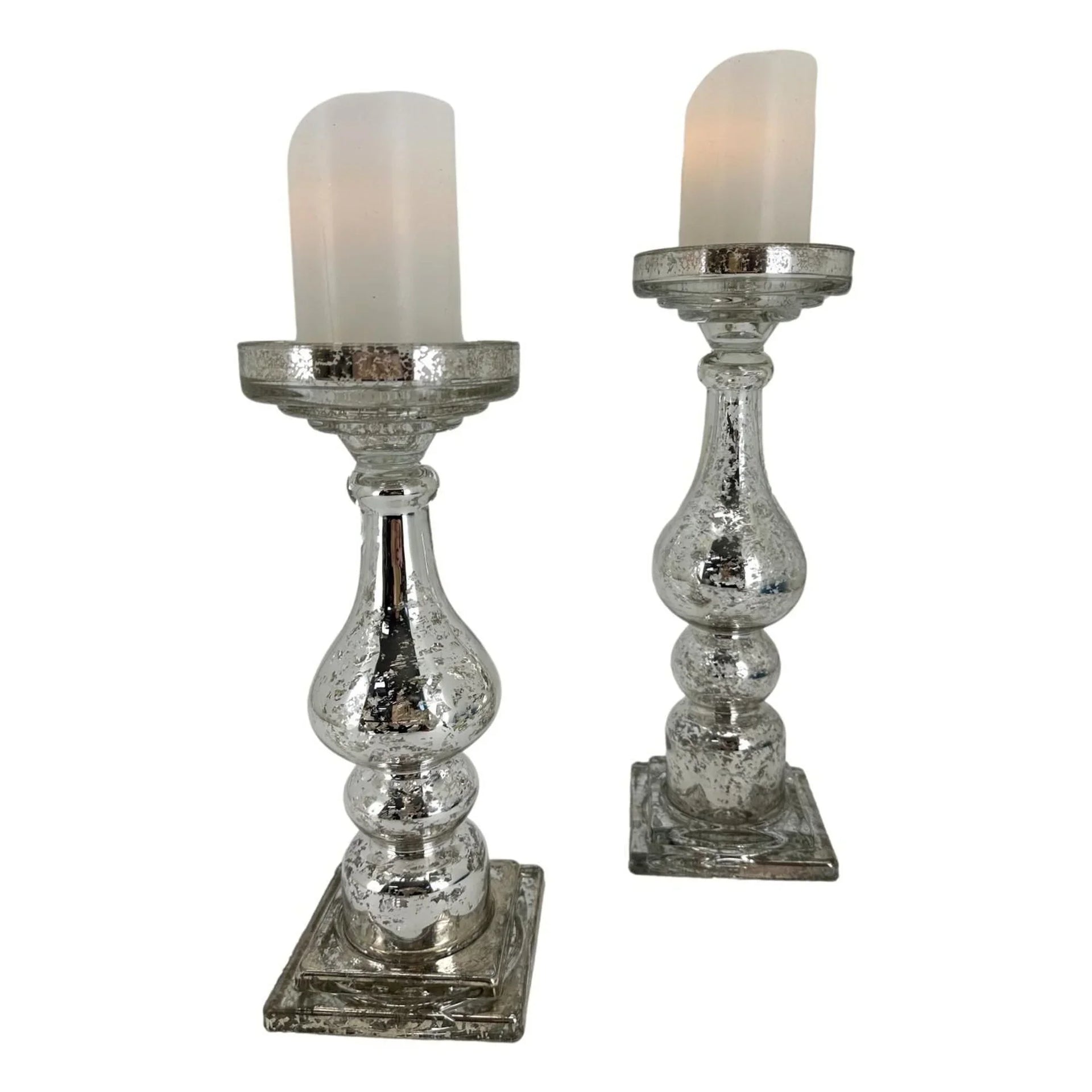 Elegant mercury glass candle holders with vintage charm, perfect for home décor and ambient lighting