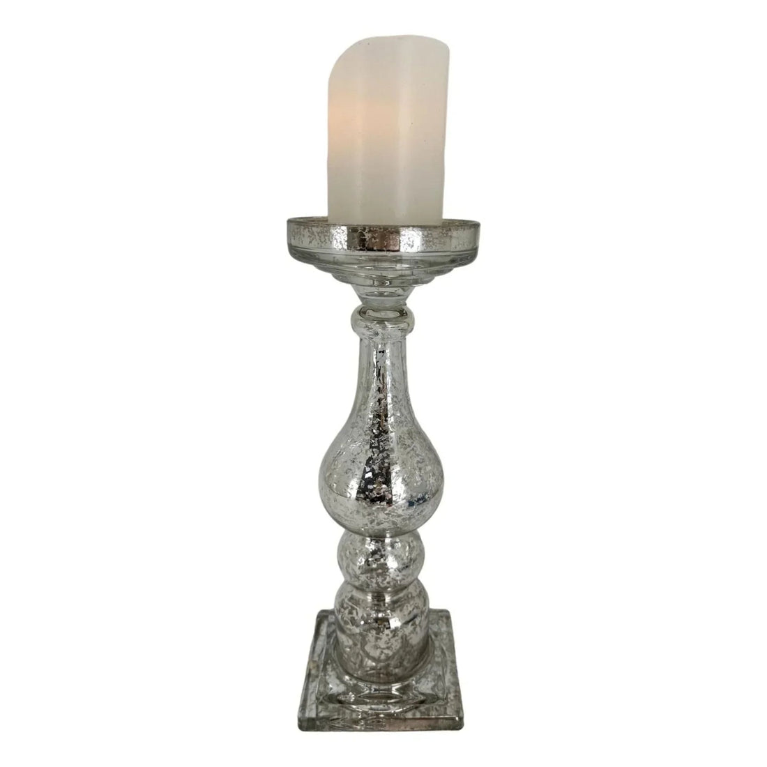 Mercury glass candle holder with vintage-inspired design, perfect for elegant home décor and ambient lighting.