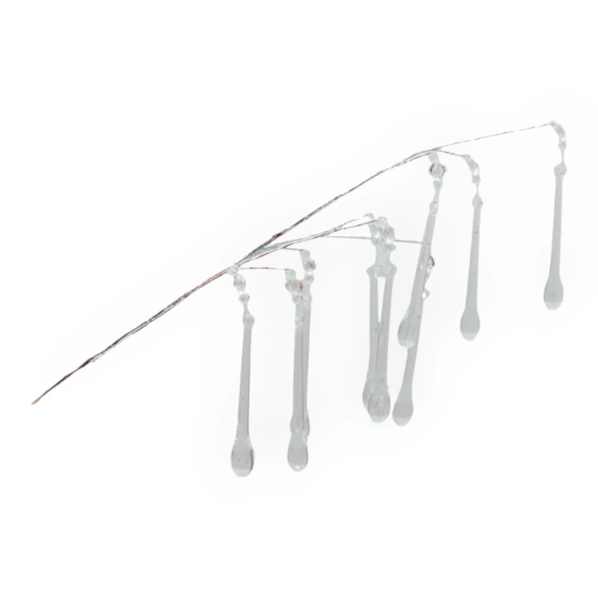 Clear glass icicle ornaments hanging from wire, elegant home décor for festive or vintage styling