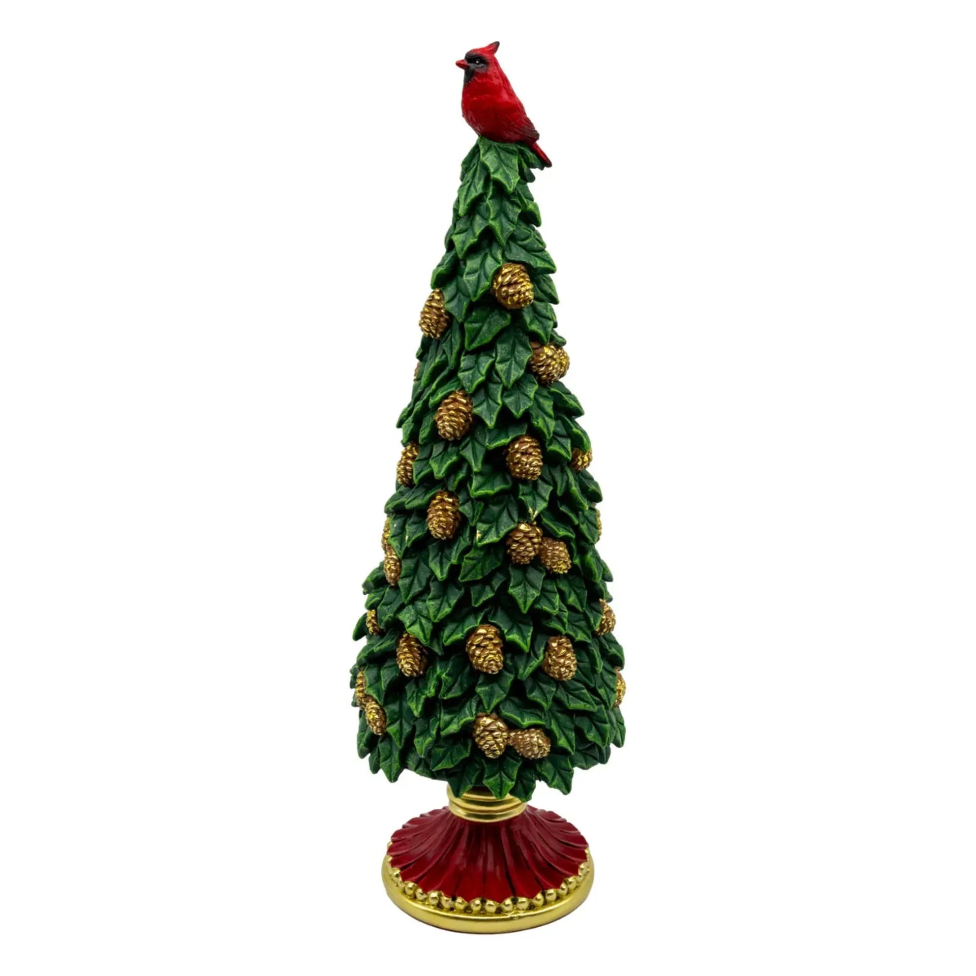 Red cardinal perched atop a green leafy Christmas tree with gold pinecones and red base, festive holiday decor