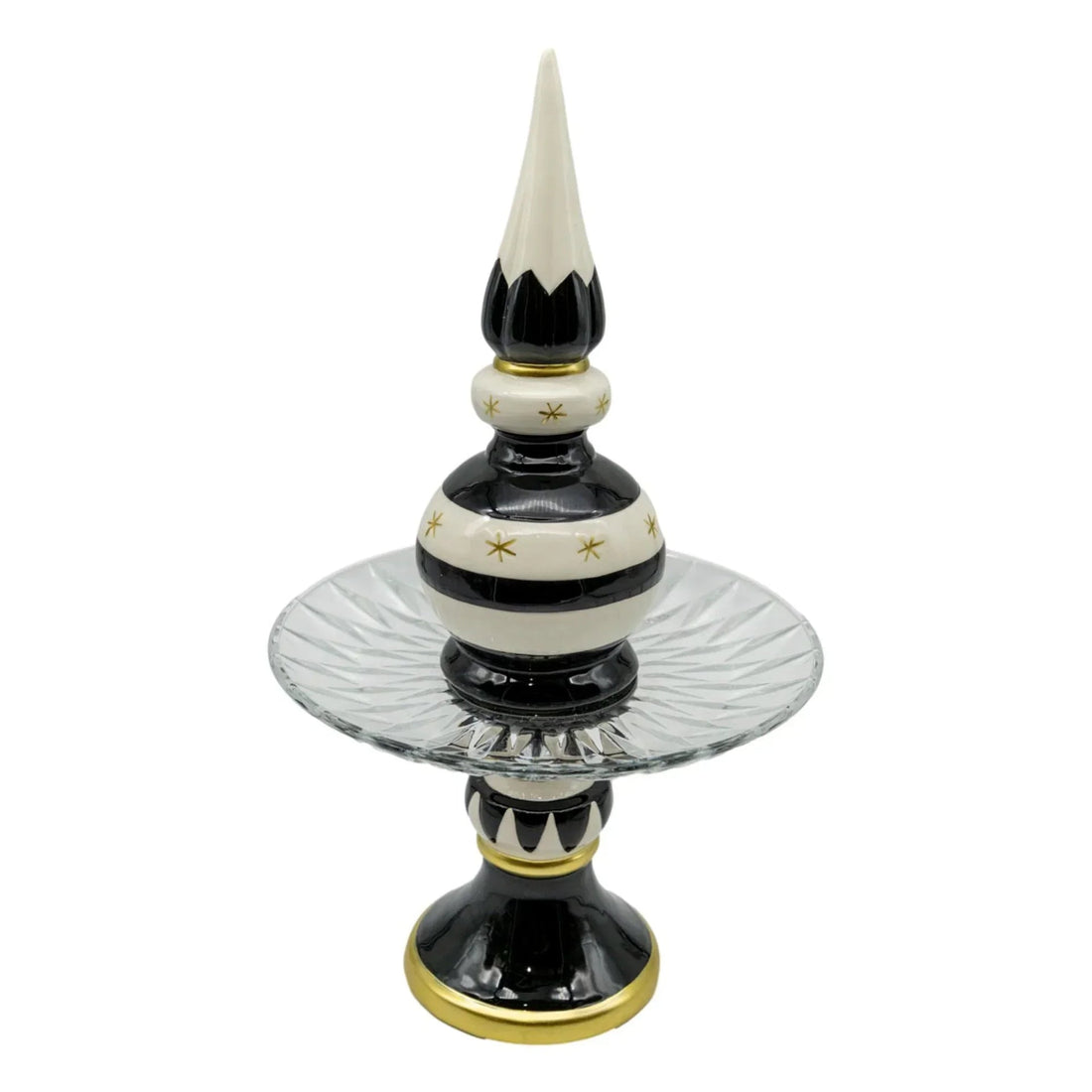 Black and white ceramic finial with gold star accents on glass pedestal, elegant home décor accent