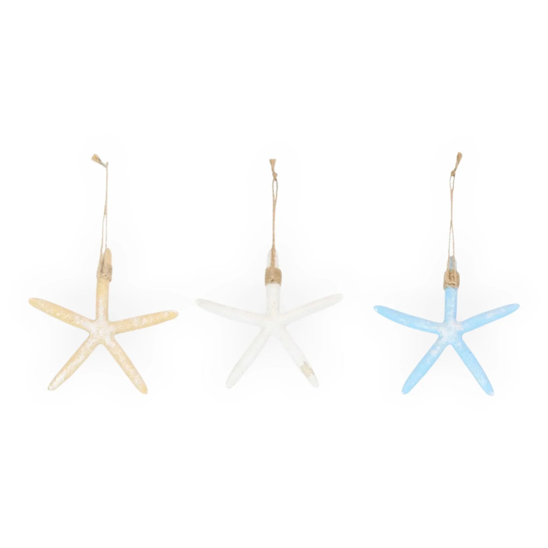 Set of three coastal starfish ornaments in beige, white, and blue with jute hangers for beach home décor