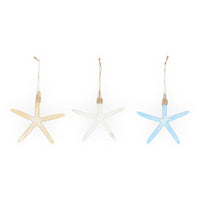 Set of three coastal starfish ornaments in beige, white, and blue with jute hangers for beach home décor