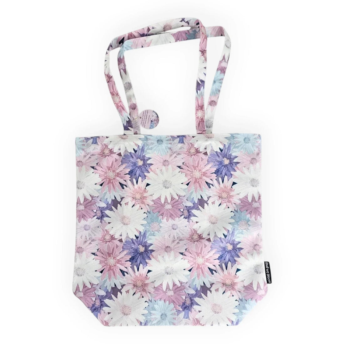 Pastel floral tote bag with daisy print, perfect for eco-friendly shopping or everyday use