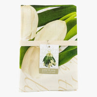 Pure linen tea towel with white tulip and green leaf print, elegant home decor accessory