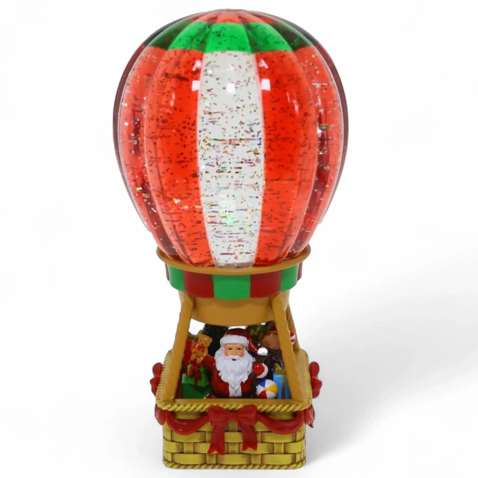 Santa in festive hot air balloon snow globe with red, green, and white glittery design