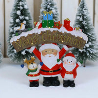 Santa, reindeer & snowman holding 'Merry Christmas' sign with gifts, festive holiday décor for home