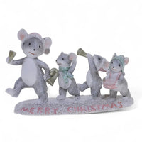 Four festive mice figurines playing instruments with Merry Christmas base, holiday home decor