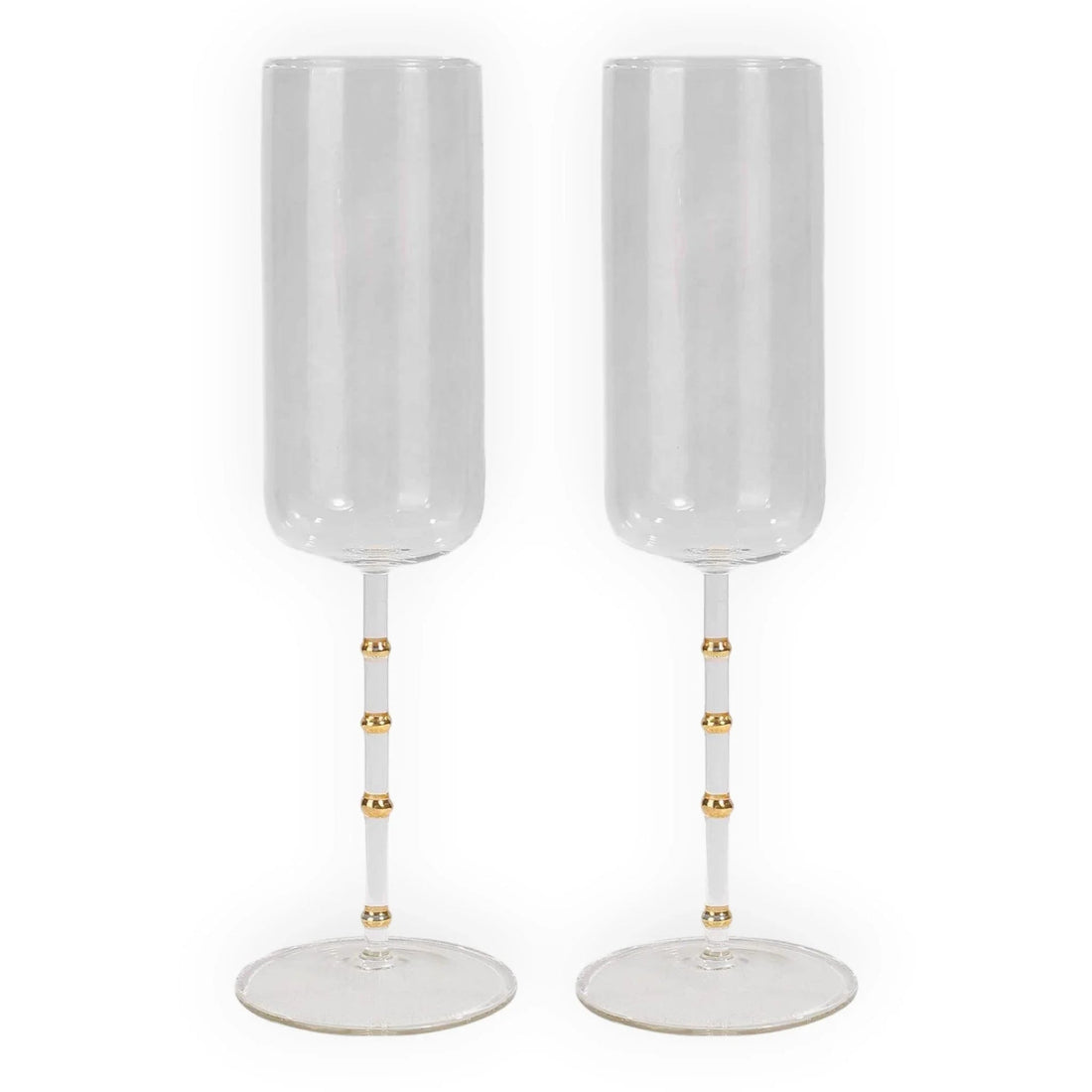 Elegant champagne flutes with gold accents, perfect for luxury home décor and special occasions.