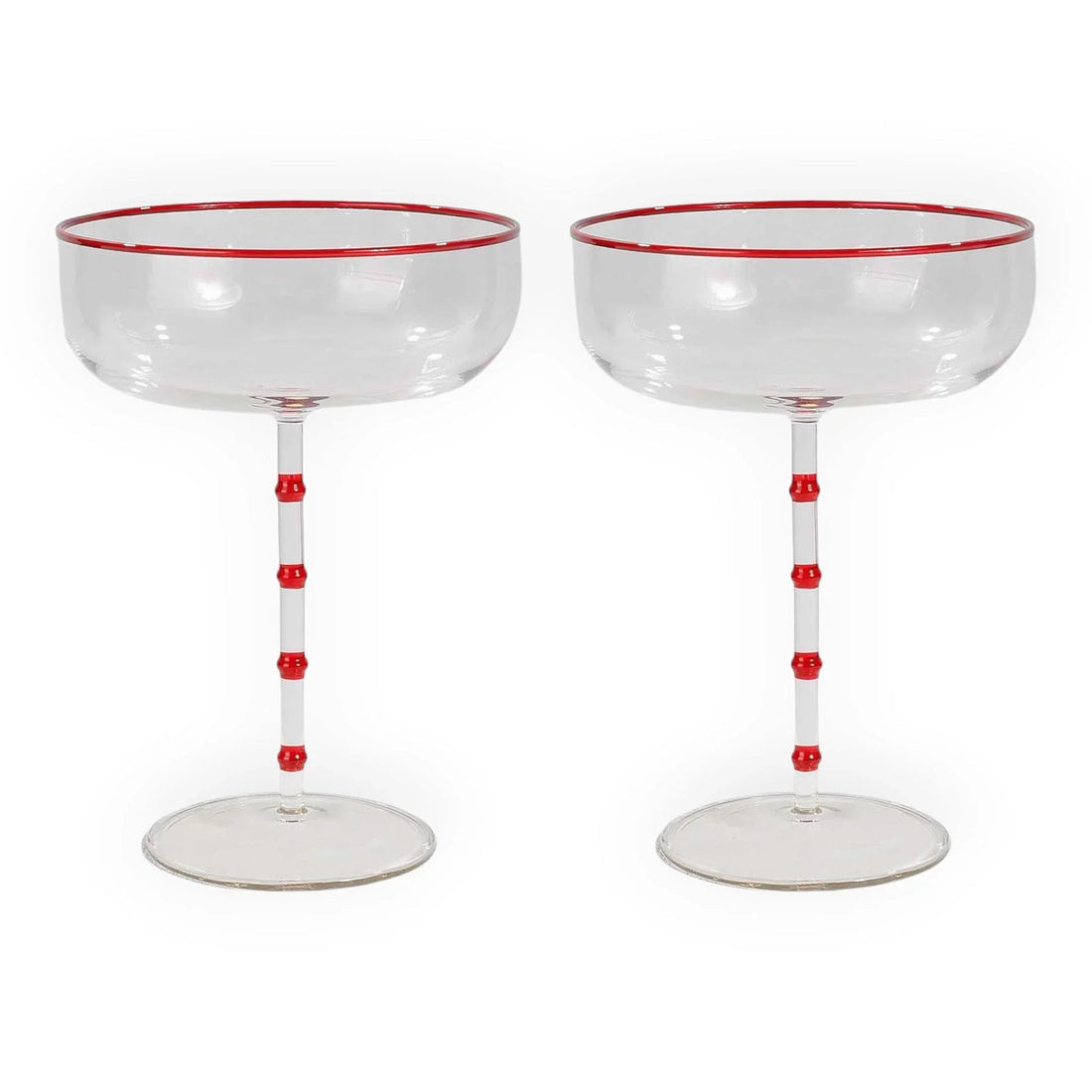 Red-rimmed coupe glasses with bamboo-style stems, elegant home barware for vintage-inspired entertaining.