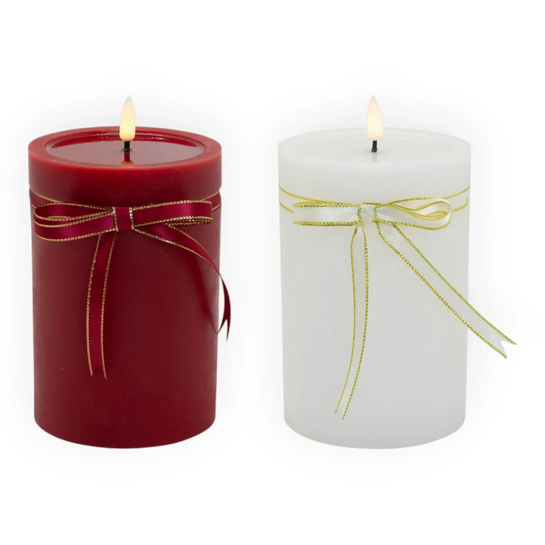 Red and white pillar candles with gold-trimmed ribbons, glowing flame for home décor ambiance