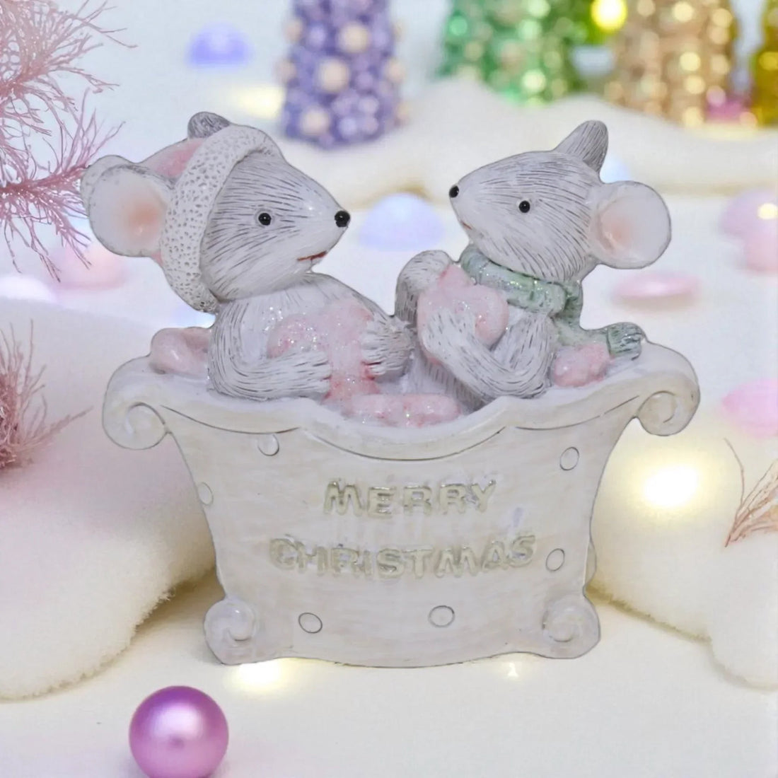 Merry Christmas mouse figurine with festive details and soft pastel accents