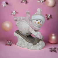 Christmas Snowman on a Sled - House Journey