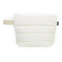 Cream quilted pouch with zip closure and carry strap, minimalist home accessory